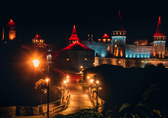castle in the night Kamianets-Podilskyi Ukraine
