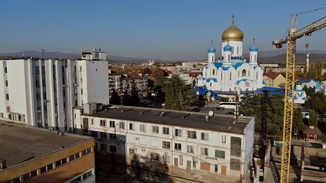 View of the city from the building construction a multi-storey building with tower cranes of the Uzhhorod Zakarpattya Ukraine