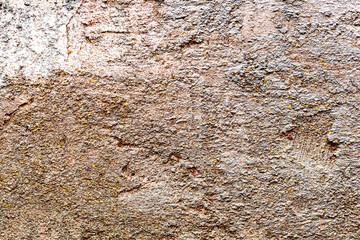 Texture of a concrete wall with cracks and scratches which can be used as a background