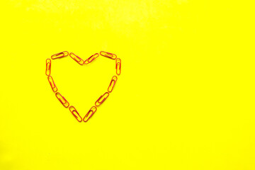 On a yellow background symbol of love, for happy women, mother, Valentine's Day, birthday greeting card design.
