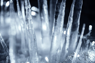 Close up crystal icicles at dark night