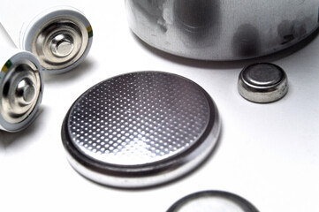 Battery group of different types and sizes on a white background