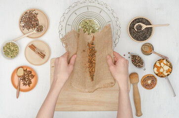Step by step preparation of masala tea with spices. Step 6- pour the chopped cinnamon sticks into...