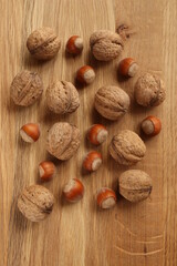 Background of hazelnuts and walnuts