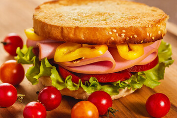 Sandwich with ham, tomatoes and  paprica.