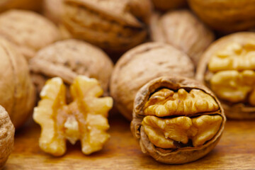 Some walnuts on dark table