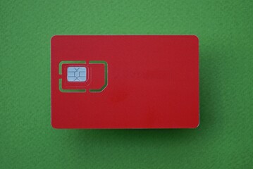 one gray chip on red paper card on green background