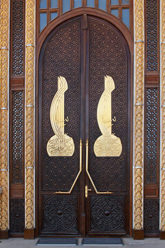 BAKU, AZERBAIJAN - APRIL 26, 2017: Tughras in arabic calligraphy on front doors of Heydar Mosque, one of the largest mosques in the Caucasus. Its total area is over 12000 square meters.