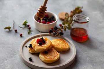 breakfast with fresh berries and honey