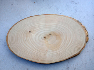 Nice wooden trivet with circles on it.