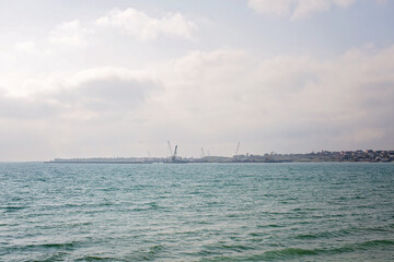 Obraz premium Blue sea and white clouds