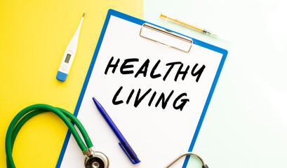 HEALTHY LIVING text on a letterhead in a medical folder on a beautiful background.
