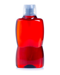 Plastic bottle of mouthwash on white background isolation