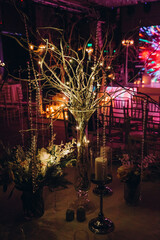   A stage for ceremonies in the style of a winter fairy tale. Wedding flower arch. Decor elements. Winter composition.