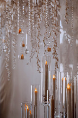   A stage for ceremonies in the style of a winter fairy tale. Wedding flower arch. Decor elements. Winter composition.