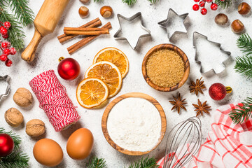 Christmas baking background on white table.