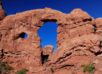 View Through Turret Arch Arches National Park Utah On A Sunny Summer Day With A Clear Blue Sky © Joerg