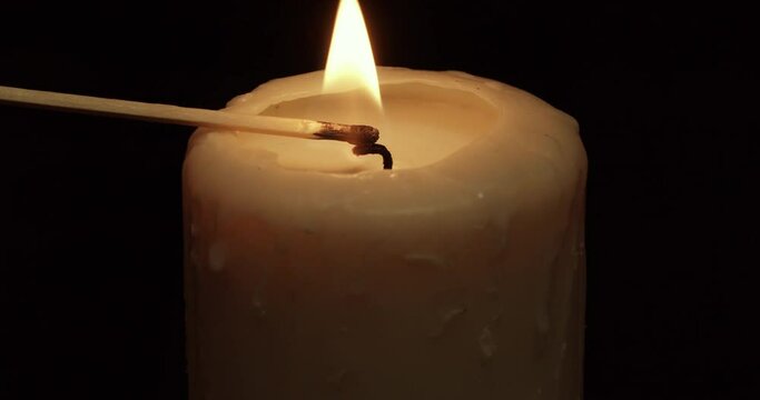 Lighting up a candle and blowing it out