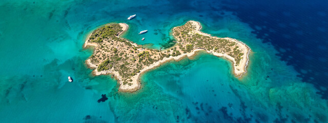 Aerial drone ultra wide panoramic photo of tropical exotic mediterranean bay with luxurious yachts and turquoise sea