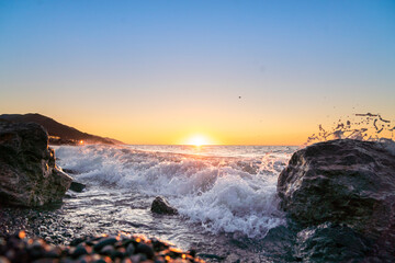 Obraz premium Sunset over rocks near the sea. Sinop Karadeniz