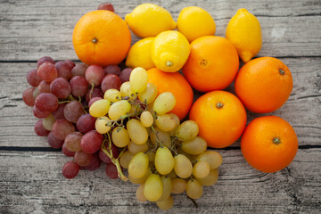 Bright fruits lie on the table. Vitamins.