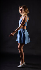 Naklejka premium female figure in clothes, studio portrait