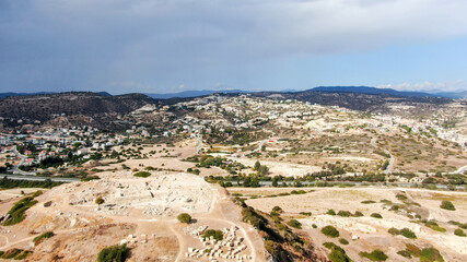 View of the city of Larnaca from above, shooting from a quadrocopter. Flat frame on the city streets. Horizontal panorama of southern Cyprus with the horizon line. The coastline and the sea.