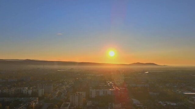 Panorama view of roof foggy during sunrise of the city from the mountain of the Uzhhorod Zakarpattya Ukraine