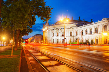 Fototapeta premium The famous historic Burgtheater in evening time. Austrian National Theatre in Vienna is tourist attraction.
