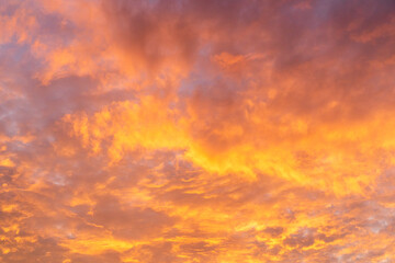 The sunset over the clouds and the pastel sky