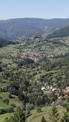 Fototapeta na wymiar Rucar-Bran mountain pass in Romania. Down below Rucar village.