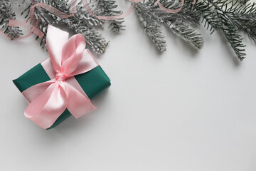 christmas card with gift box and christmas tree