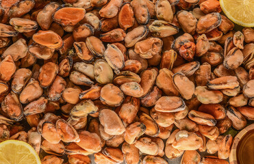 frozen mussels, in oil and marinade. Textures from delicious seafood