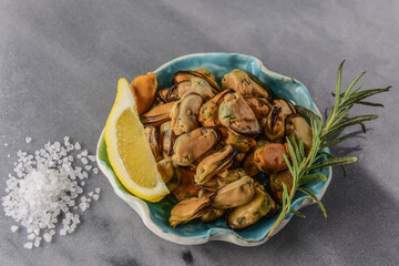 frozen mussels, in oil and marinade. Textures from delicious seafood