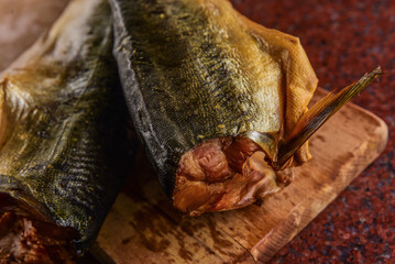 Pieces and strips of red fish, salmon fillets in different cooking methods. Salted and smoked trout