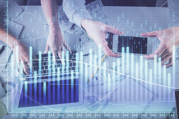 Multi exposure of man and woman working together and forex graph hologram drawing. Financial analysis concept. Computer background. Top View.