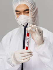 Male Asian appearance laboratory Science treatment research close-up