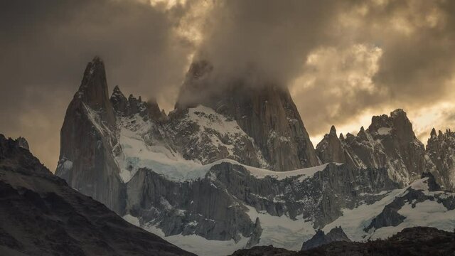 Fitz Roy in Patagonia Lands, Awesome Light and Clouds Mix at Sunset, Yellow Light behind Mountain, Luminaz