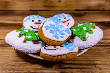 Christmas gingerbread cookies on the wooden table