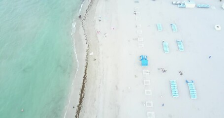 Miami Beach Aerial View South Beach. People watching is a great pastime in Miami's South Beach, which draws celebrities and beautiful people in skimpy swim attire to see and be seen.