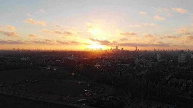 Drone slider shot of sunrise over London skyline