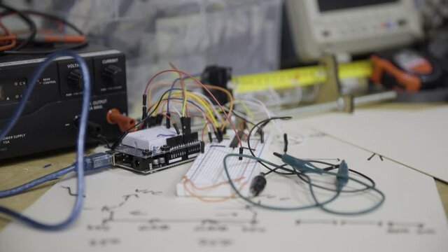 Focus shift to circuit board and power supply on a desk