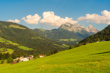 Fototapeta na wymiar Mountain valley village landscape in Salzkammergut berge Alps . Mountain green valley village view austria near hallstatt