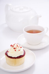 cupcake and a cup of tea