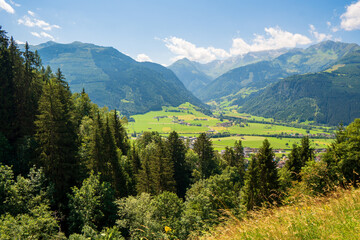 Fototapeta na wymiar Summer time countryside panoramic landscape in Austria near Mittersill village