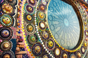 Art mosaic glass on the wall in Buddhist Thailand temple. Beautiful Landmark and Attraction of Asia. Asian culture and religion