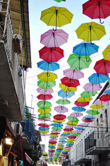 Fototapeta na wymiar umbrellas street in the city