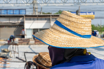 Obraz premium Women wear straw hat.