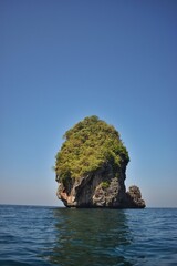 Naklejka premium Thailand, Koh Phi Phi, travelling by boat around this paradise island with turquoise water and stunning beaches. We loved that! 