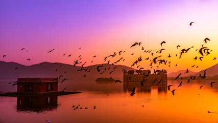 Panoramic view during Sunrise at the Jal Mahal 'Water Palace'. It is an architectural showcase of...